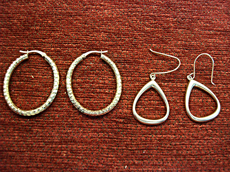Two pairs of pre-owned sterling silver earrings with unique high style designs