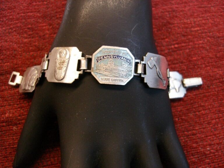 Vintage Pennsylvania souvenir bracelet with Native American symbols, State Capitol, and enamel.