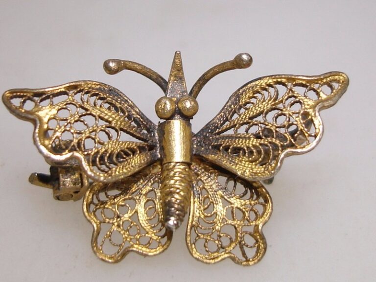 Antique Art Nouveau sterling silver butterfly pin with gold wash filigree