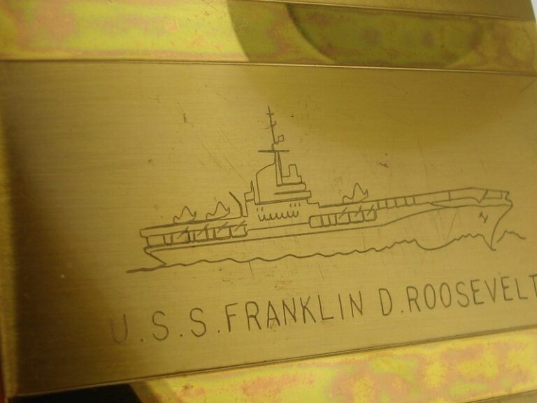Vintage WWII USS Franklin D. Roosevelt compact with engraved aircraft carrier