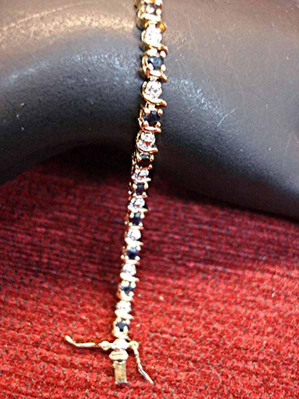 Sterling silver bracelet with gold vermeil and blue topaz stones