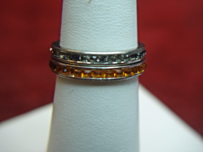 Sterling silver ring set with amber and clear stones