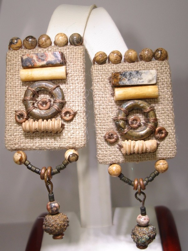Vintage artisan clip-on earrings with hand-sewn beads and metal accents