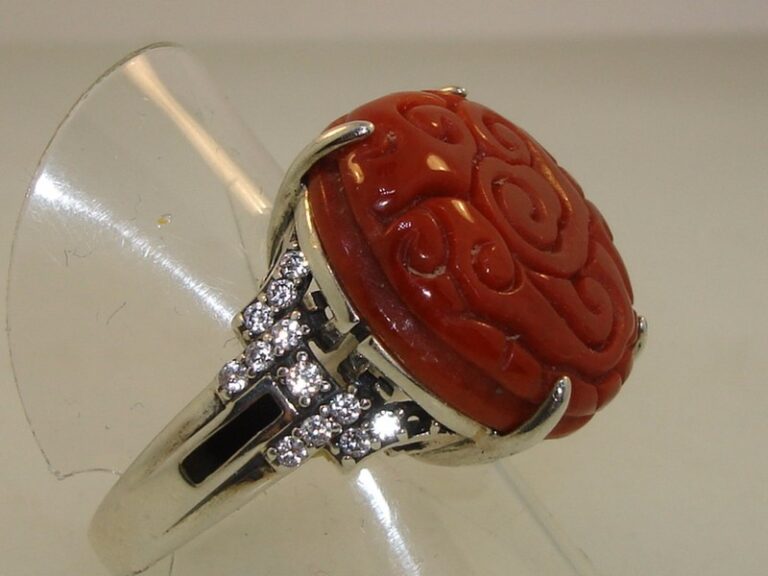 Sterling silver ring with carved red jade cabochon and CZs