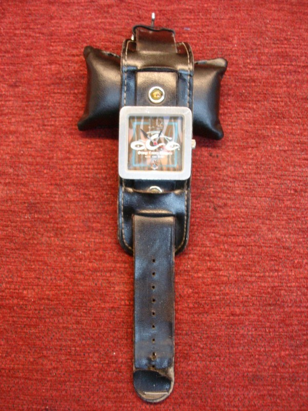 Vintage Orange County Choppers (OCC) wristwatch set with two watches.