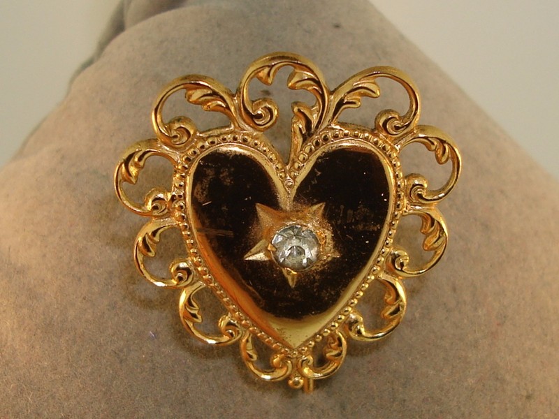 Antique Art Nouveau rose gold stick pin with a brilliant cut heart design