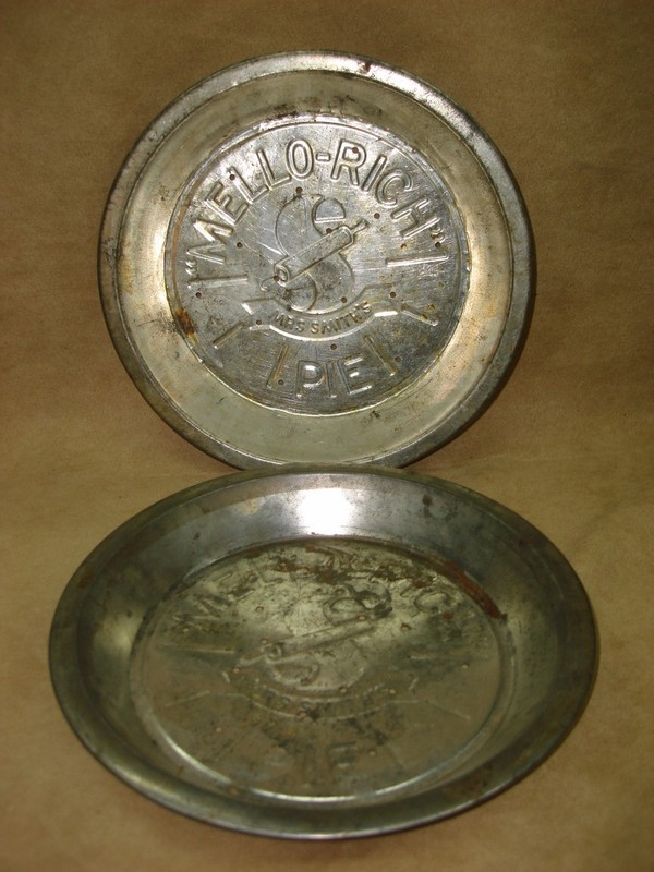 Vintage pair of Mrs. Smith's Mello-Rich pie plates, 9.5 inches each, showing signs of use.