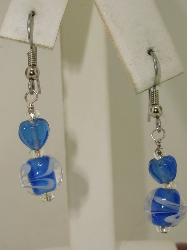 Sterling silver dangle earrings with clear and cobalt blue art glass