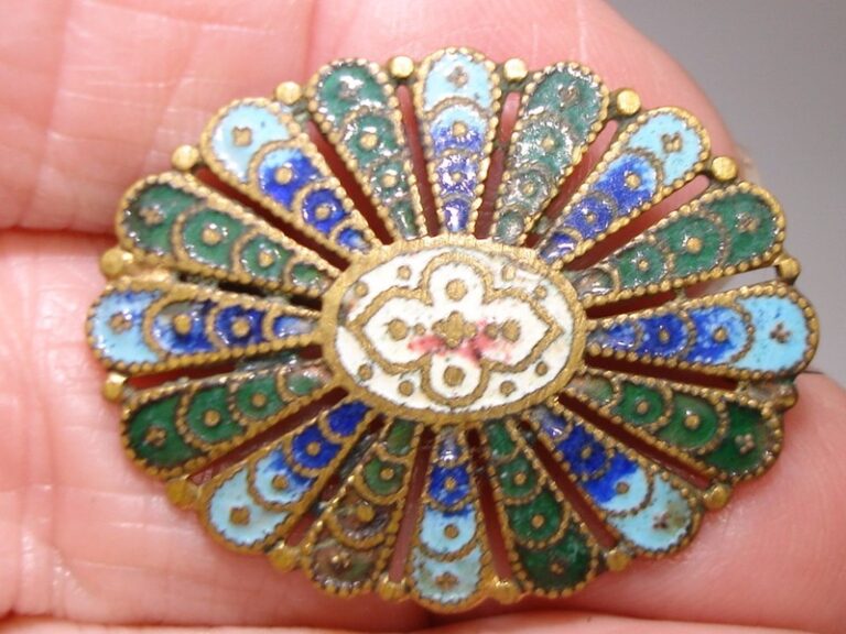 Antique Victorian cloisonne enamel pin with colorful design and barrel hinge