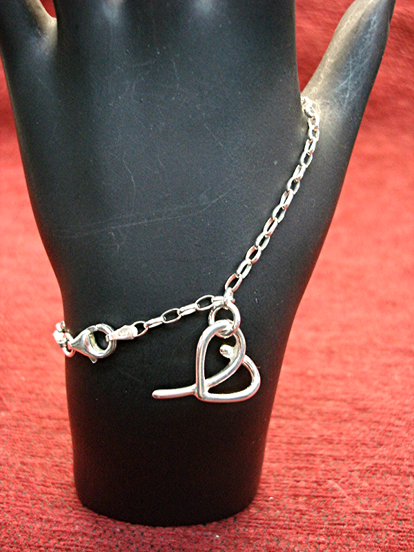 Sterling silver heart bracelet, delicate link design, pre-owned, excellent condition