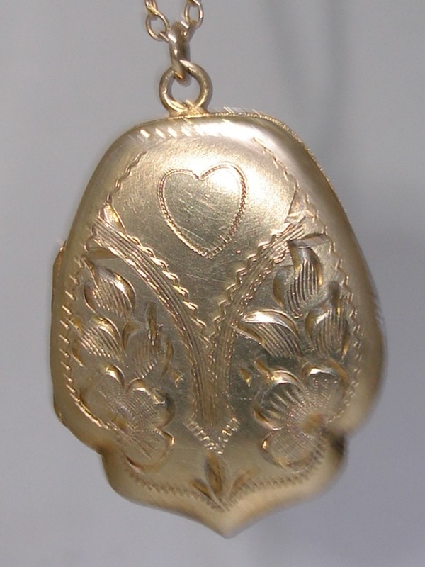 Vintage 1930s-40s silver and gold wash heart locket necklace with floral design
