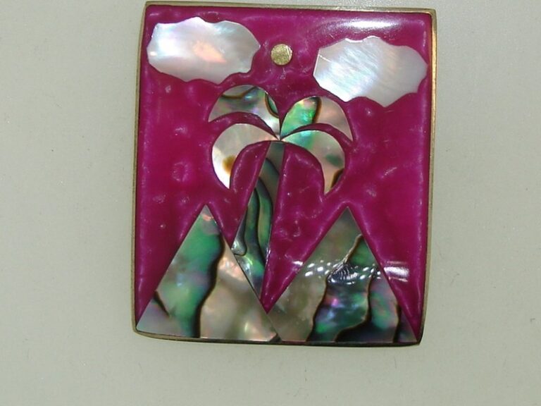 Vintage Mexico alpaca silver pin with enamel and mother-of-pearl mountains, palm trees, and clouds