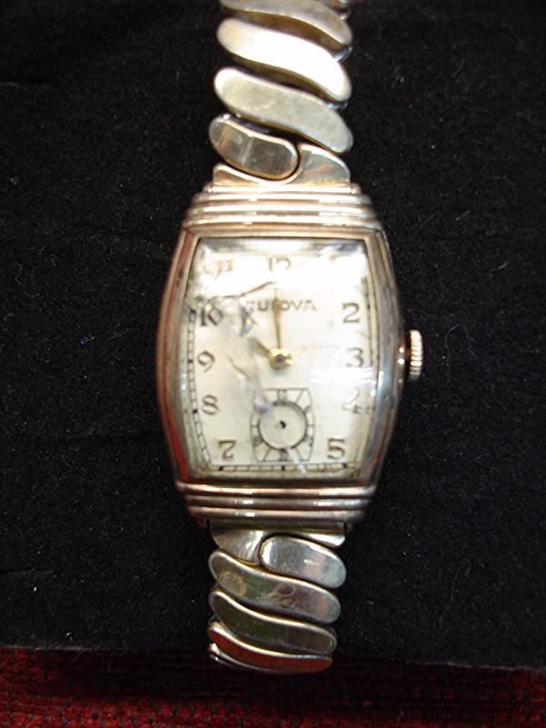Vintage Bulova wristwatch with 17 jewels, rolled gold plate case, and fancy lugs. Running condition.