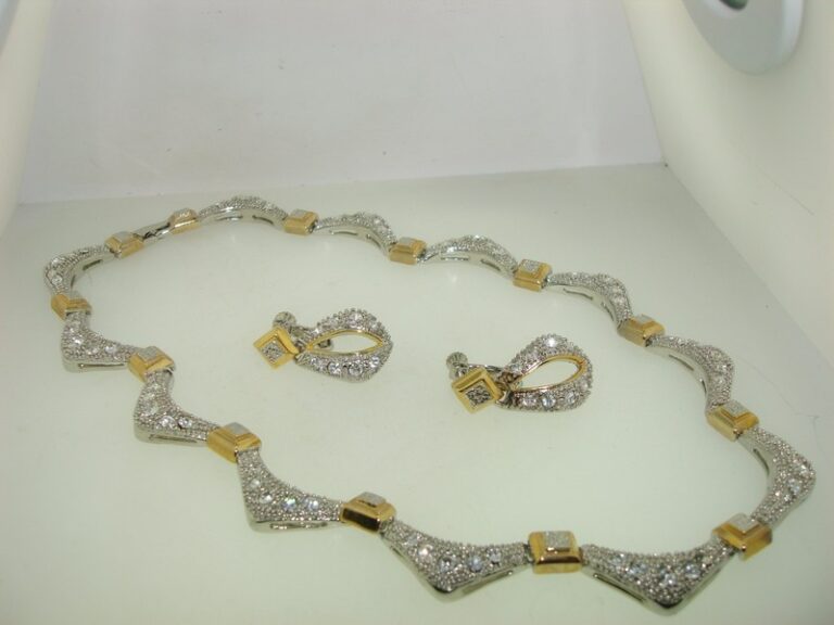 Sparkling silver and gold tone CZ necklace and dangle earring set