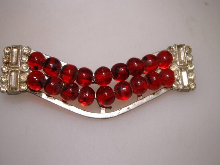 Vintage 1940s pot metal pin with rhinestones and red beads