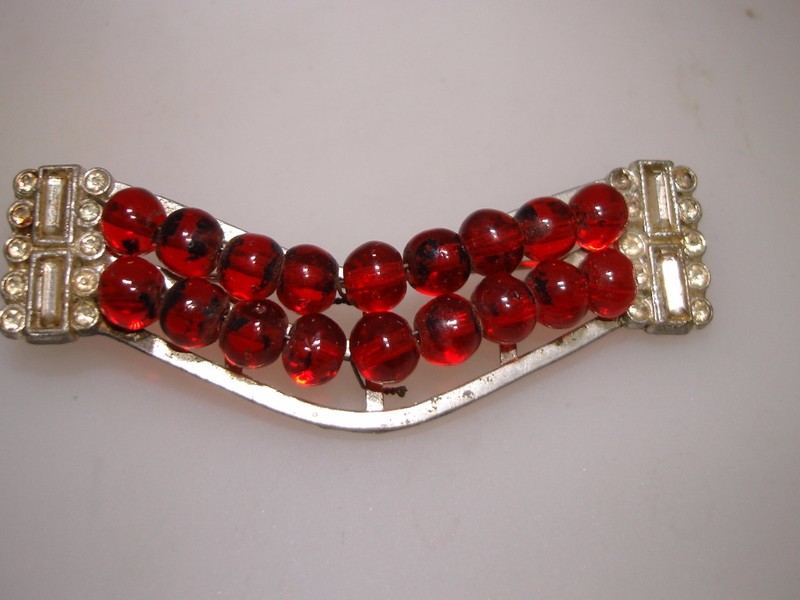 Vintage 1940s pot metal pin with rhinestones and red beads