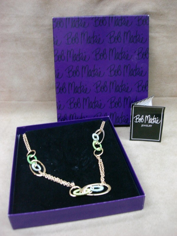 Vintage 1980s Bob Mackie woven knit necklace in gold tone with green and blue accents, original box
