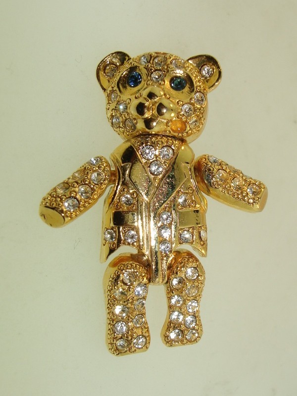 Vintage Danecraft articulated golden bear rhinestone pin