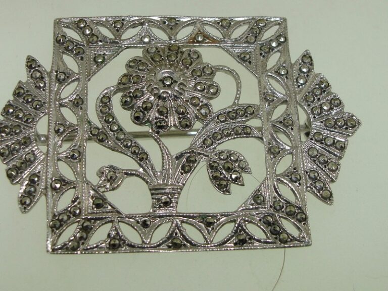 Art Nouveau sterling silver filigree pin brooch with marcasites, floral design