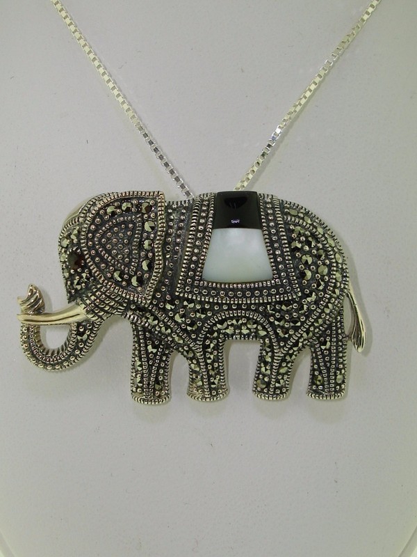 Vintage sterling silver elephant pendant/pin with marcasite, onyx, and mother of pearl