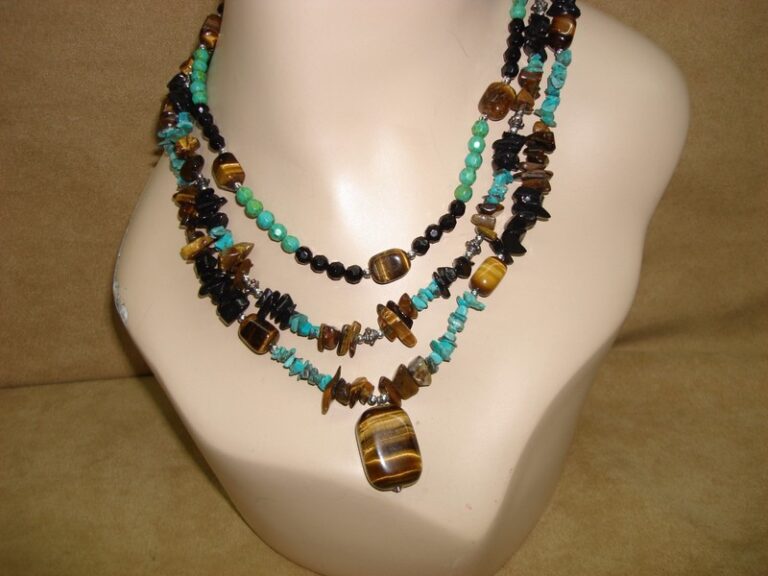 Silver tiger's eye, onyx, and turquoise three-strand necklace