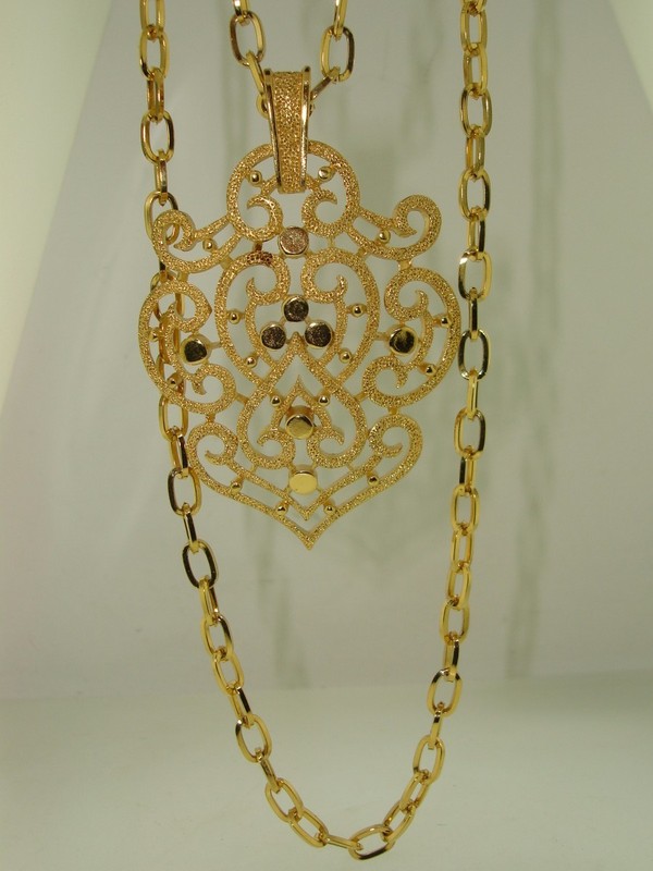 Vintage Crown Trifari gold tone filigree pendant necklace, 1960s