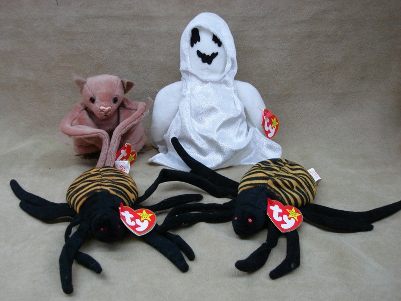 Set of four vintage retired Ty Beanie Babies: Sheets, Batty, and two Spinners in mint condition.
