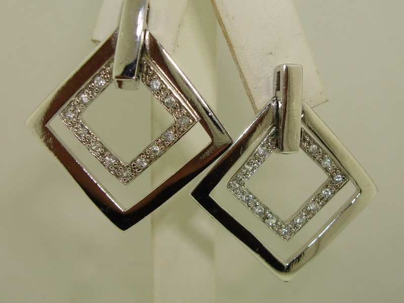 Sterling silver dangle earrings with cubic zirconia accents