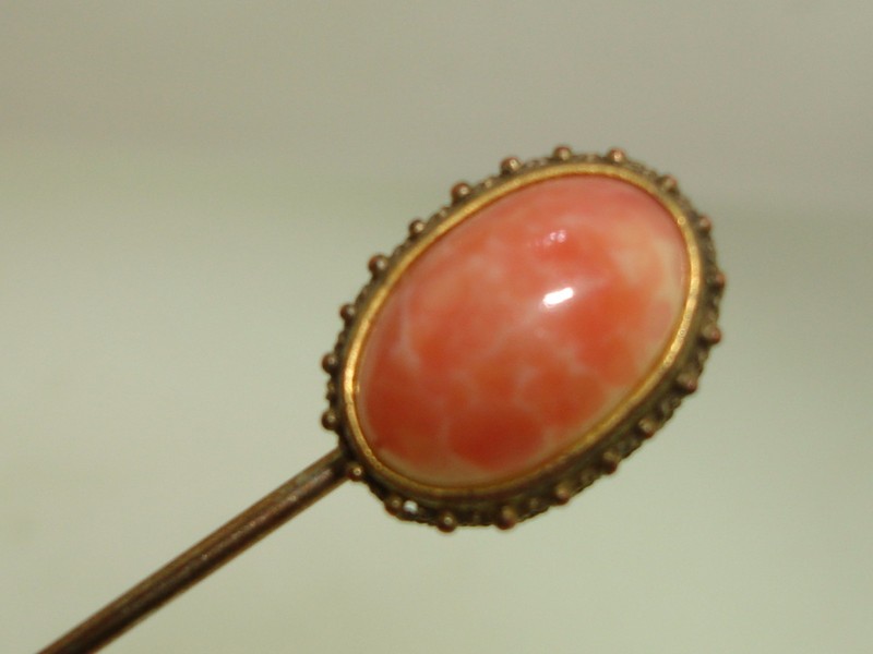 Victorian gold-washed coral glass stick pin