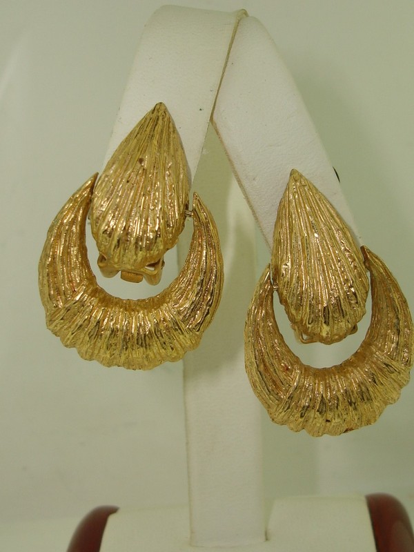 Vintage 1956 brushed gold clip-on earrings, patent number 2733491