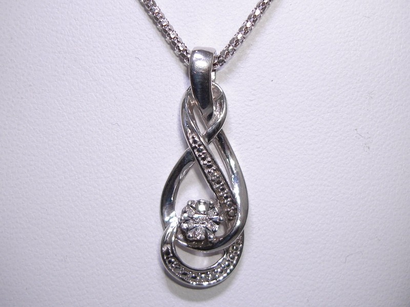 Sterling silver and diamond eternity pendant necklace