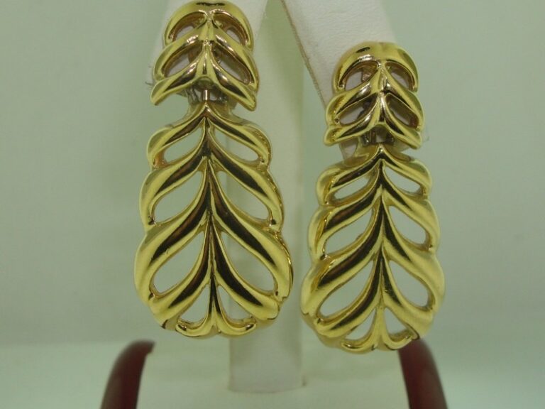 Vintage Trifari gold-tone dangle earrings from the 1970s or 1980s.