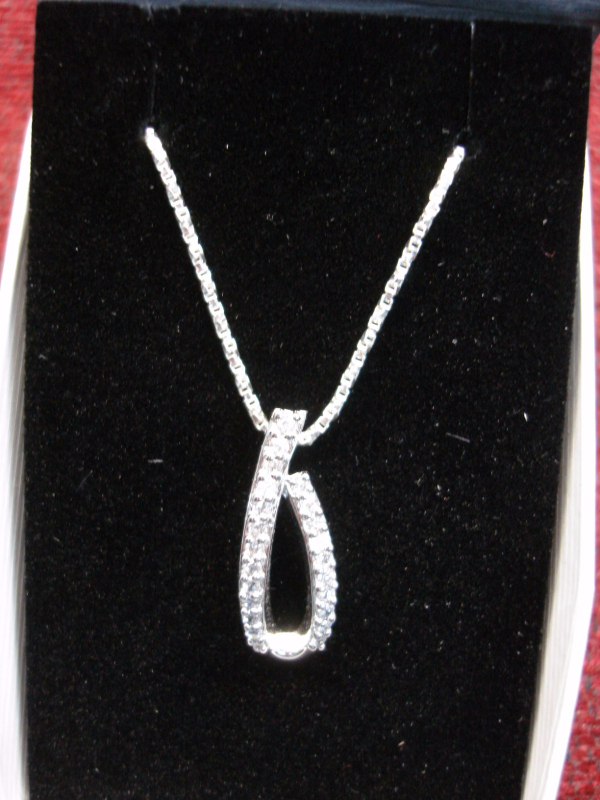 Sterling silver chain and pendant set with cubic zirconia stones
