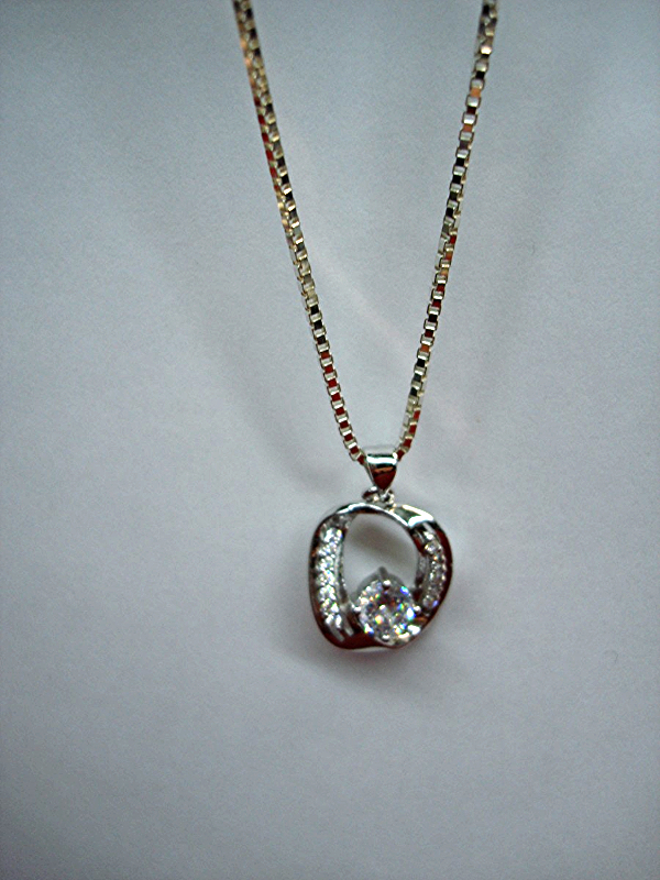 Sterling silver pendant and chain set with a 6.5mm center stone