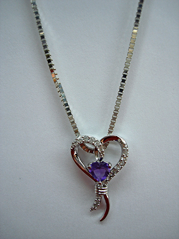 Sterling silver amethyst heart pendant necklace with cubic zirconia accents, pre-owned excellent condition
