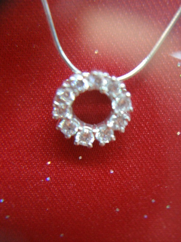 Sterling silver snake chain necklace with cubic zirconia pendant