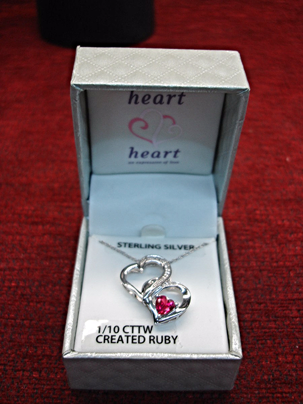 Sterling silver heart pendant with diamonds and ruby, new in box