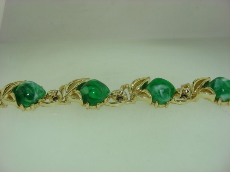 Vintage 1950s Lucite bracelet with mottled green and white thermoset design, gold-tone snap clasp