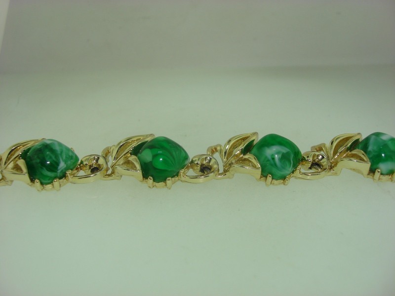 Vintage 1950s Lucite bracelet with mottled green and white thermoset design, gold-tone snap clasp