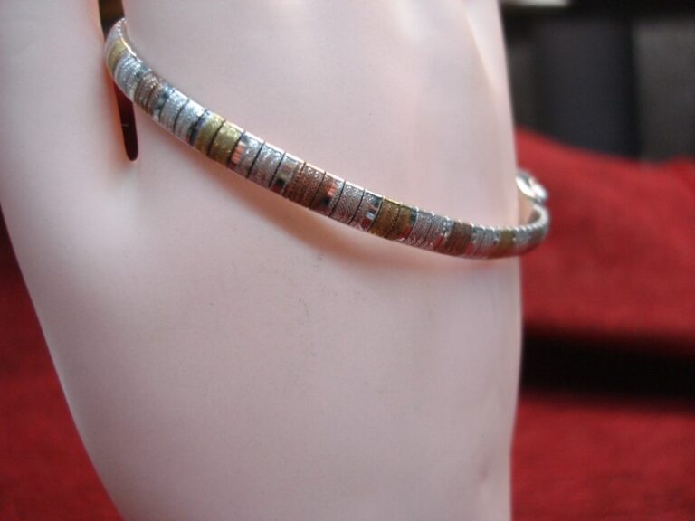 Sterling silver tri-color mesh bangle bracelet with yellow and rose gold vermeil