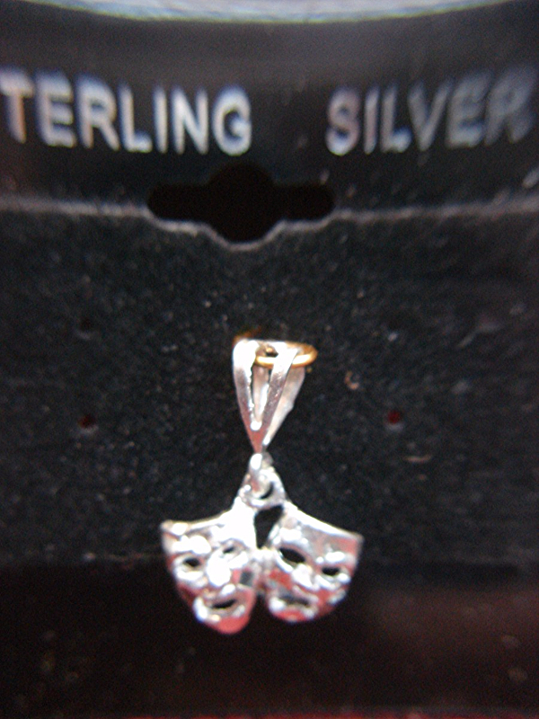 Sterling silver pendant with happy and sad mask design