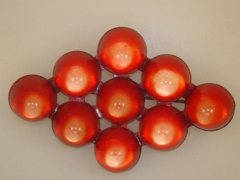 Vintage 1940s Lucite bullet cluster pin with patent number 2270210