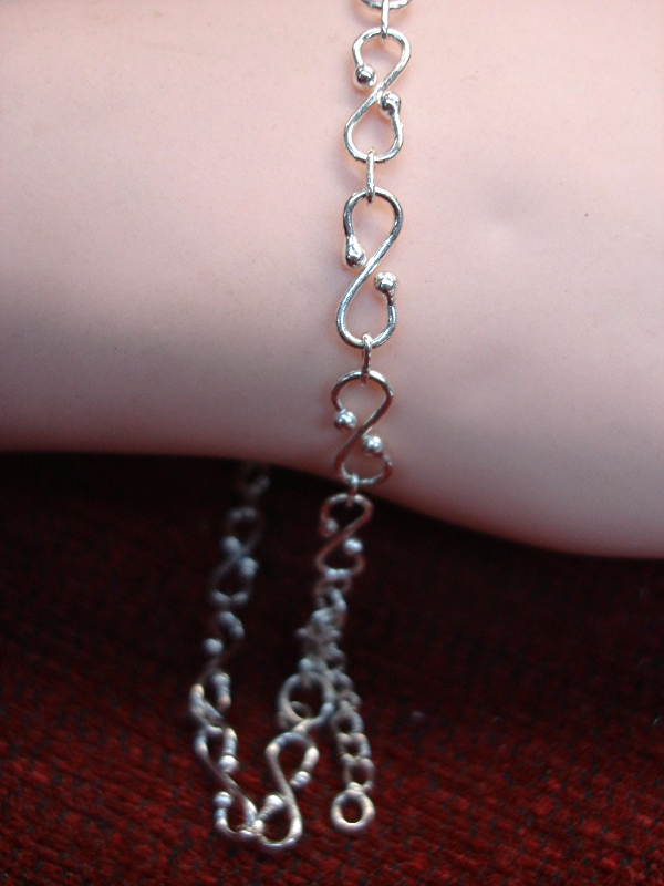 Sterling silver 'S' link bracelet, adjustable and pre-owned