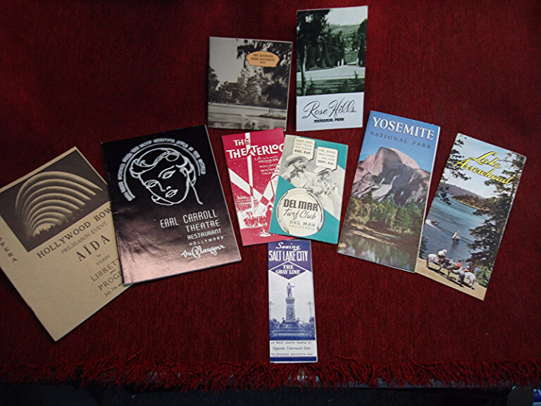 Vintage travel brochures from 1939 featuring cross-country rail journey destinations