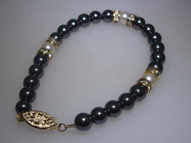 Vintage 1970s gold-filled bracelet with hematite, faux pearl, and rhinestone details