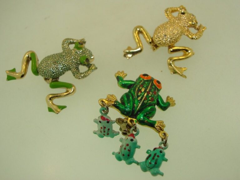 Set of 3 vintage articulated frog enamel pins from the 1970s and 1980s
