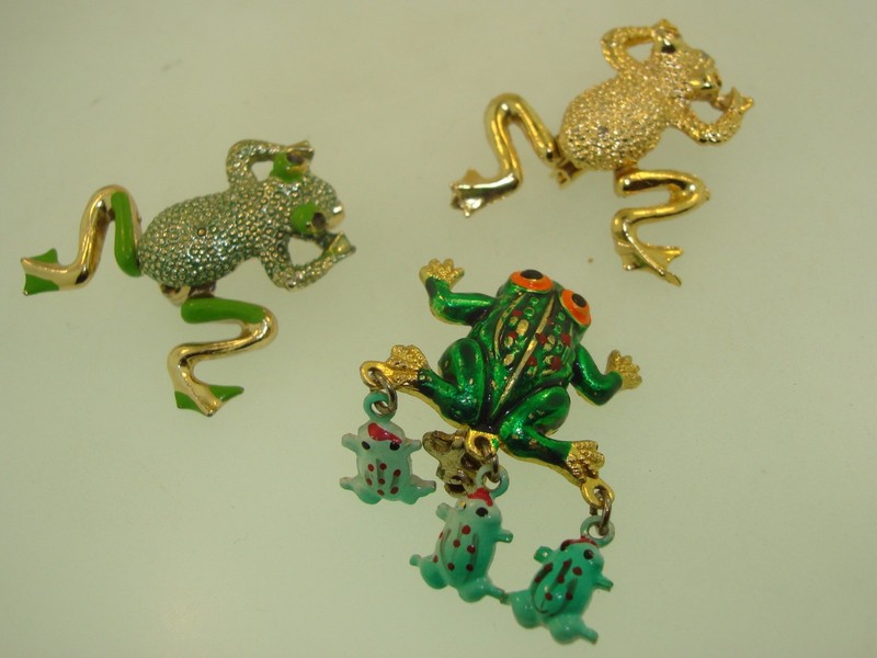 Set of 3 vintage articulated frog enamel pins from the 1970s and 1980s