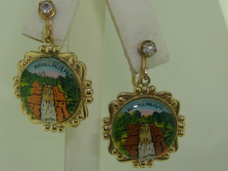 Vintage 1960s dangle earrings featuring a reverse-carved glass dome with a scenic image of Bushkill Falls, PA.