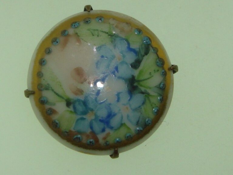 Antique hand-painted porcelain forget-me-not pin with gold trim