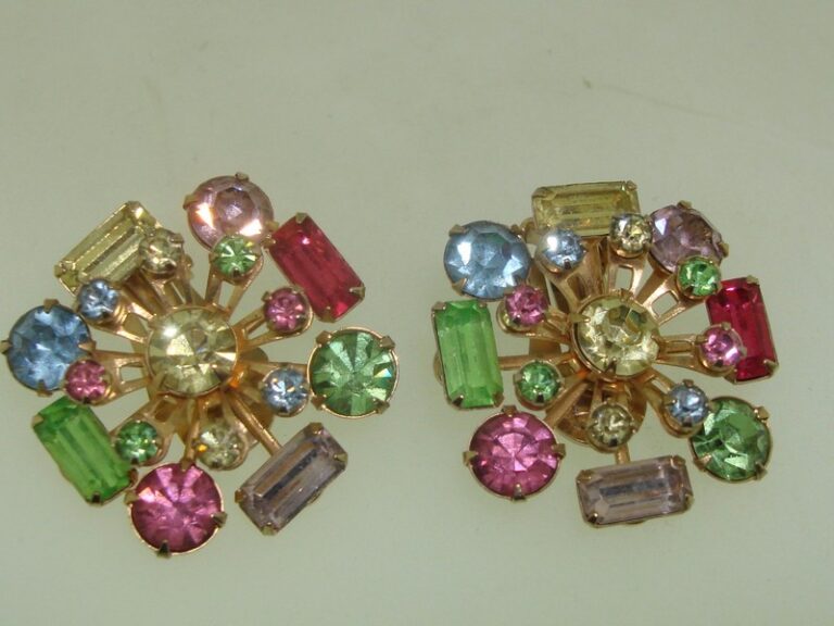 Vintage 1950s foiled rhinestone clip-on earrings in pastel pink, blue, green, and mauve.